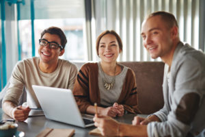 Group of happy young friends or modern business people